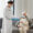 Caregiver assisting senior with personal care in a comfortable home setting, reflecting Lasting Legacy Healthcare Services' commitment to in-home support for seniors in Pinellas Park.